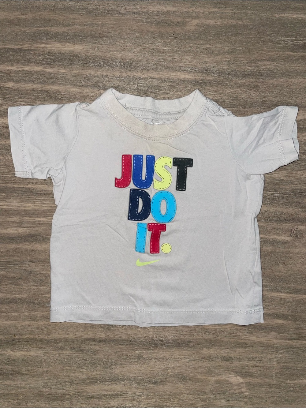 Nike Light Gray Kids Short-Sleeve Tee with Multicolor "JUST DO IT" Logo